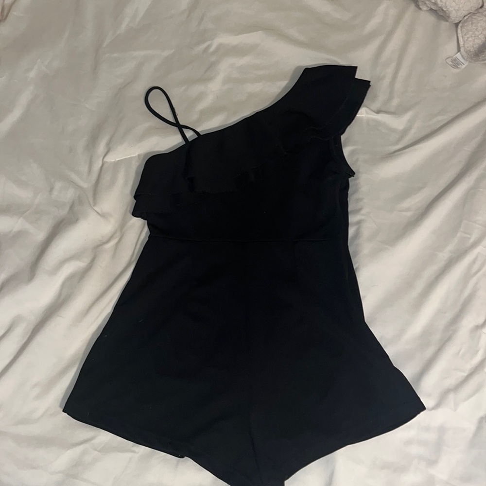 black romper, ruffles at top, size Small but can fit a medium, side zipper